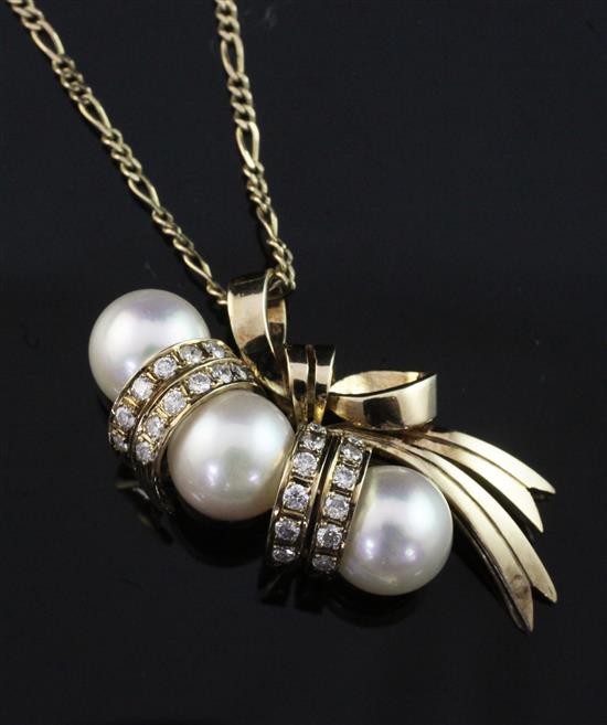 A 14ct gold, cultured pearl and diamond set pendant, pendant width 1.25in.